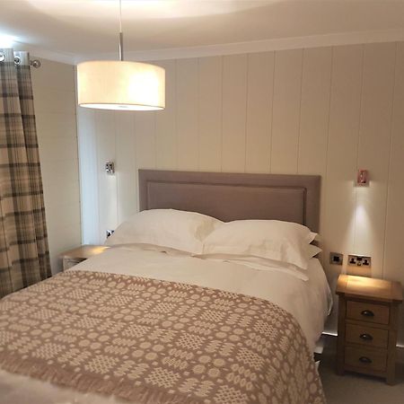 Llyn Brenig Lodge เบเทส-อี-คอย ภายนอก รูปภาพ