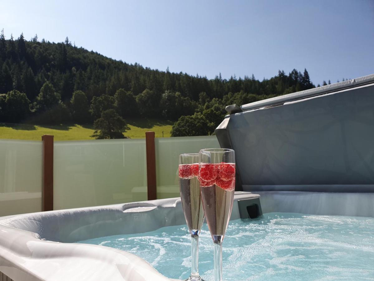 Llyn Brenig Lodge เบเทส-อี-คอย ภายนอก รูปภาพ